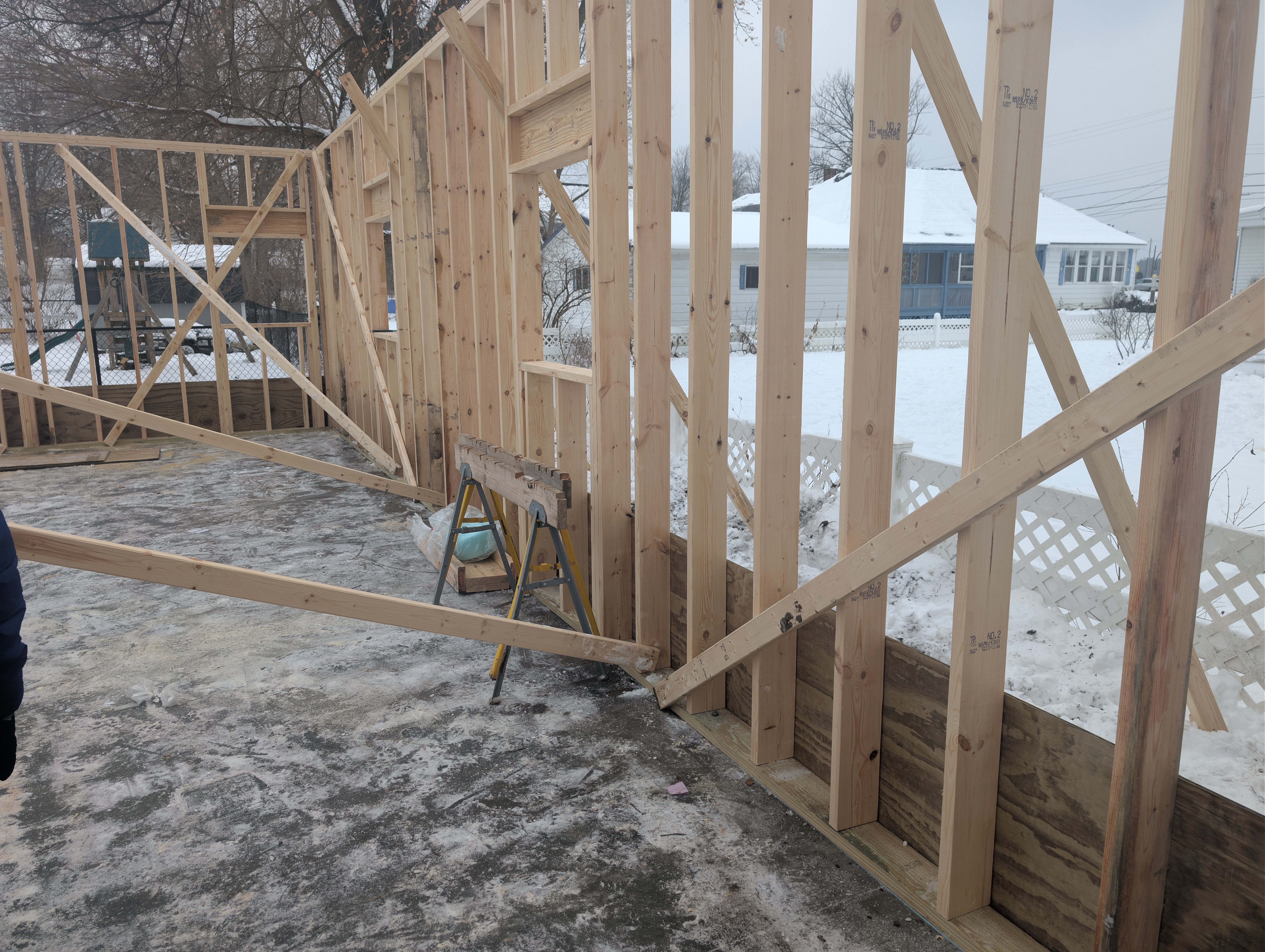 Interior view showing diagonal bracing across framed walls