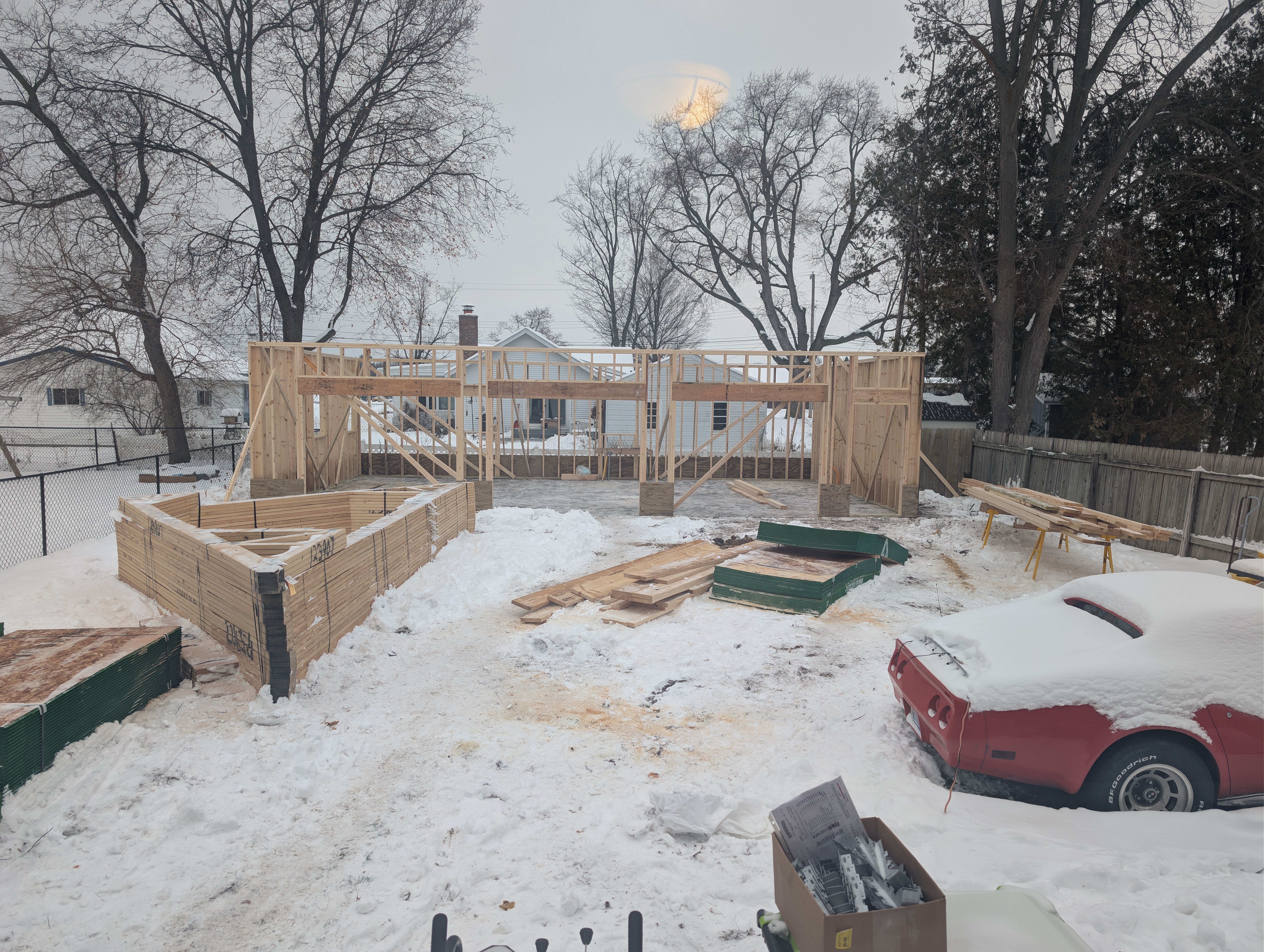 Afternoon overview of framed walls and staged materials