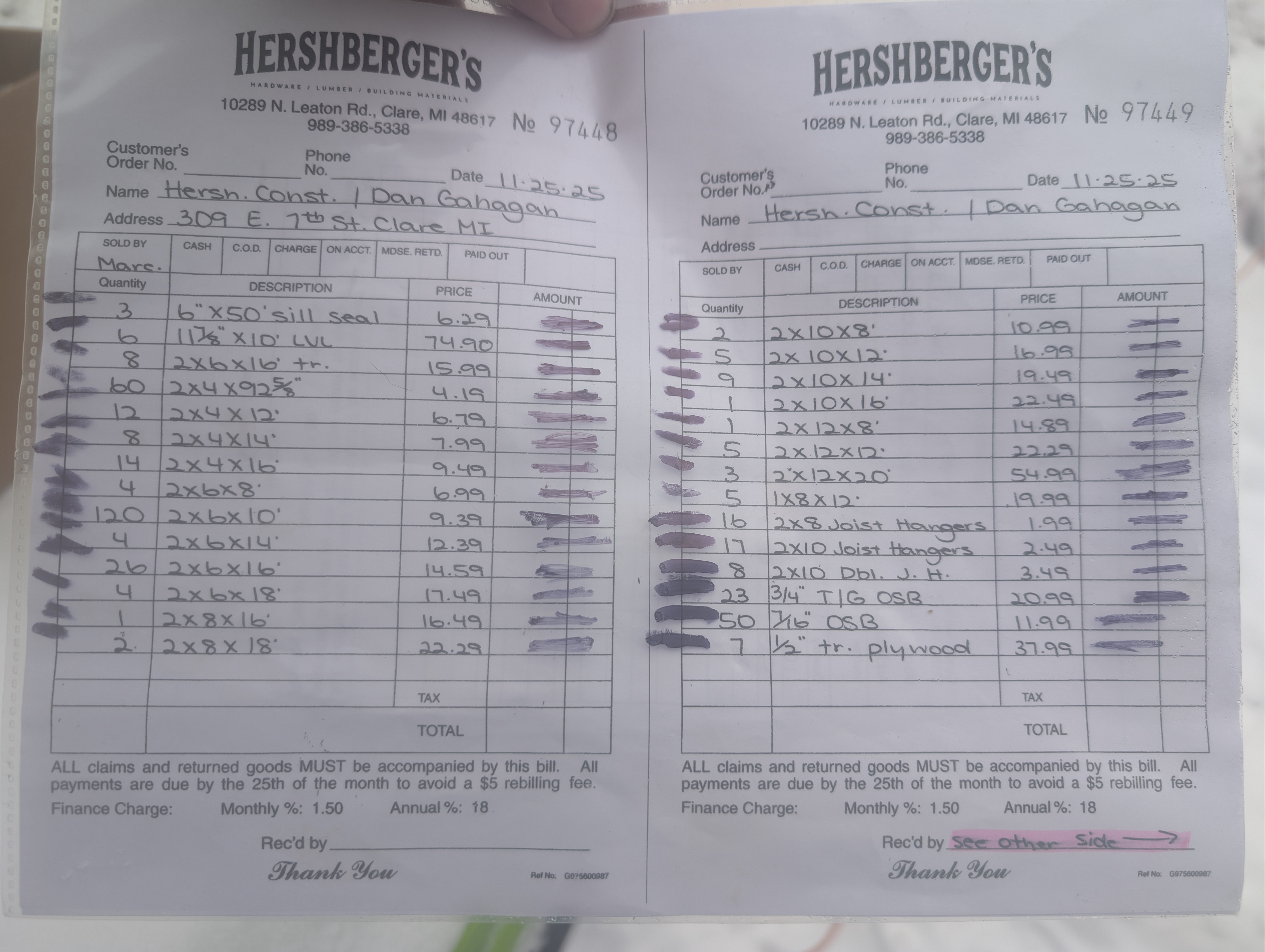 Alternate photo of two Hershberger's lumber invoices