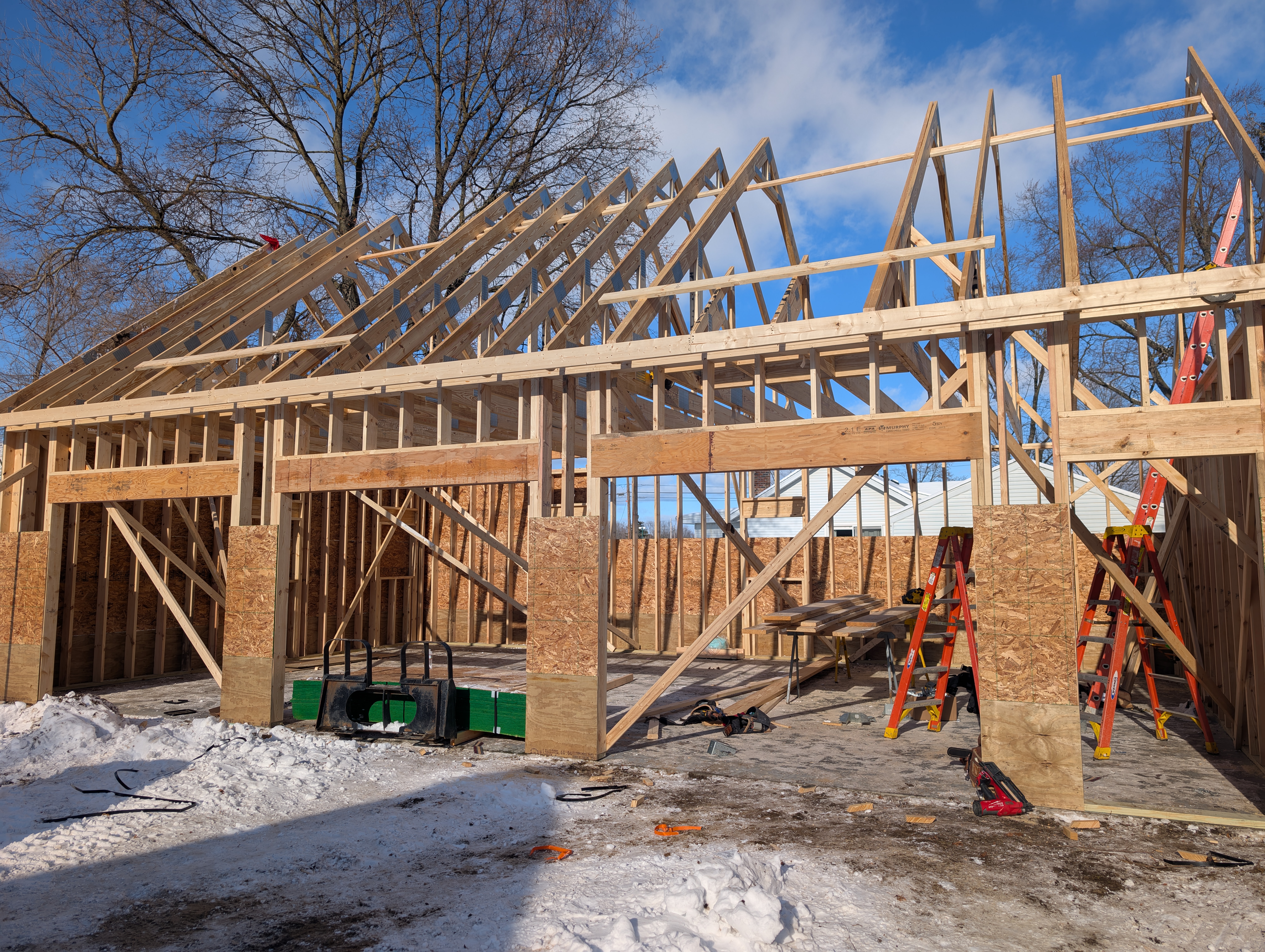 Angled front view showing roof truss alignment and bracing