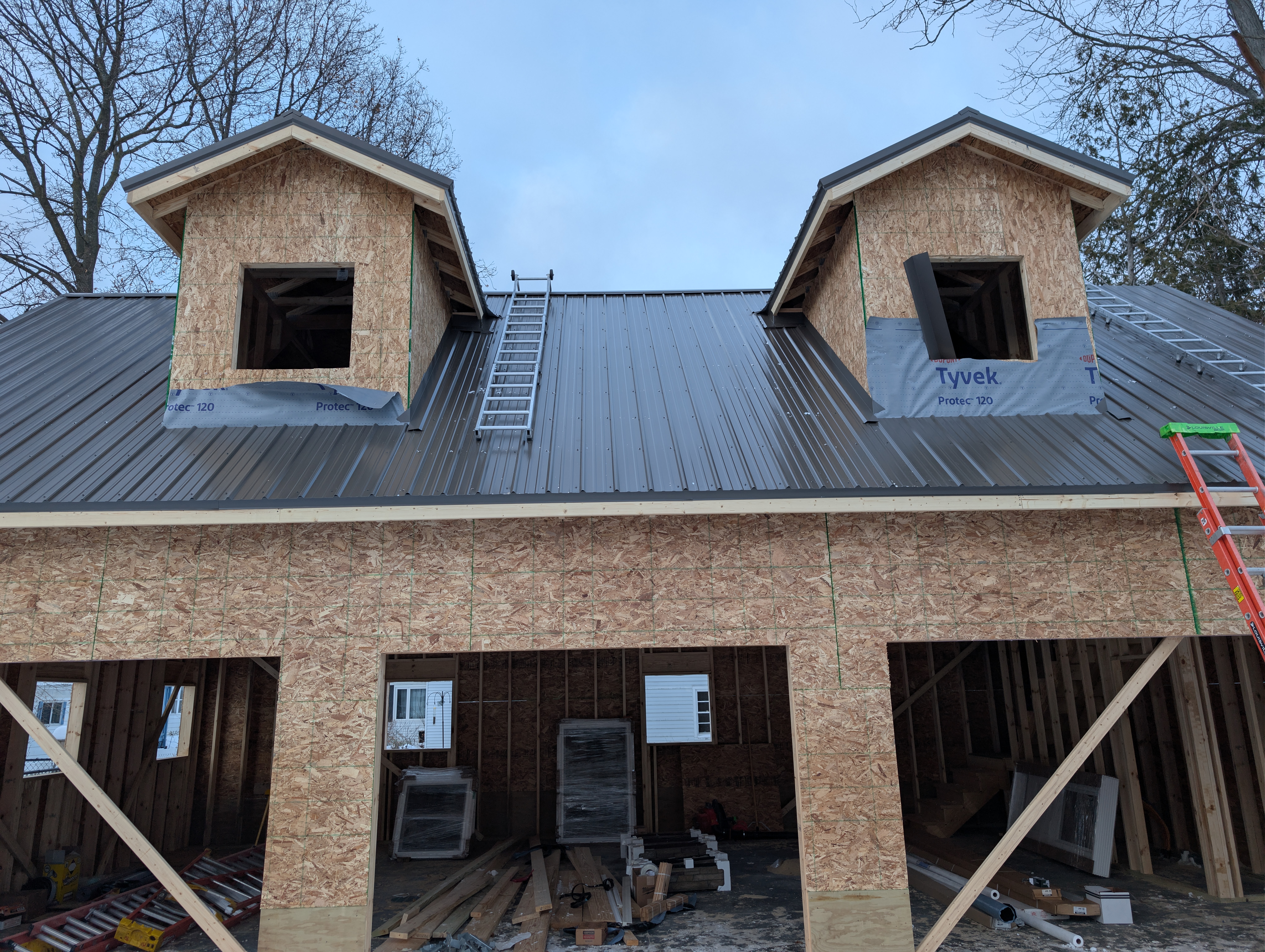 Closeup of metal roof panels at dormers