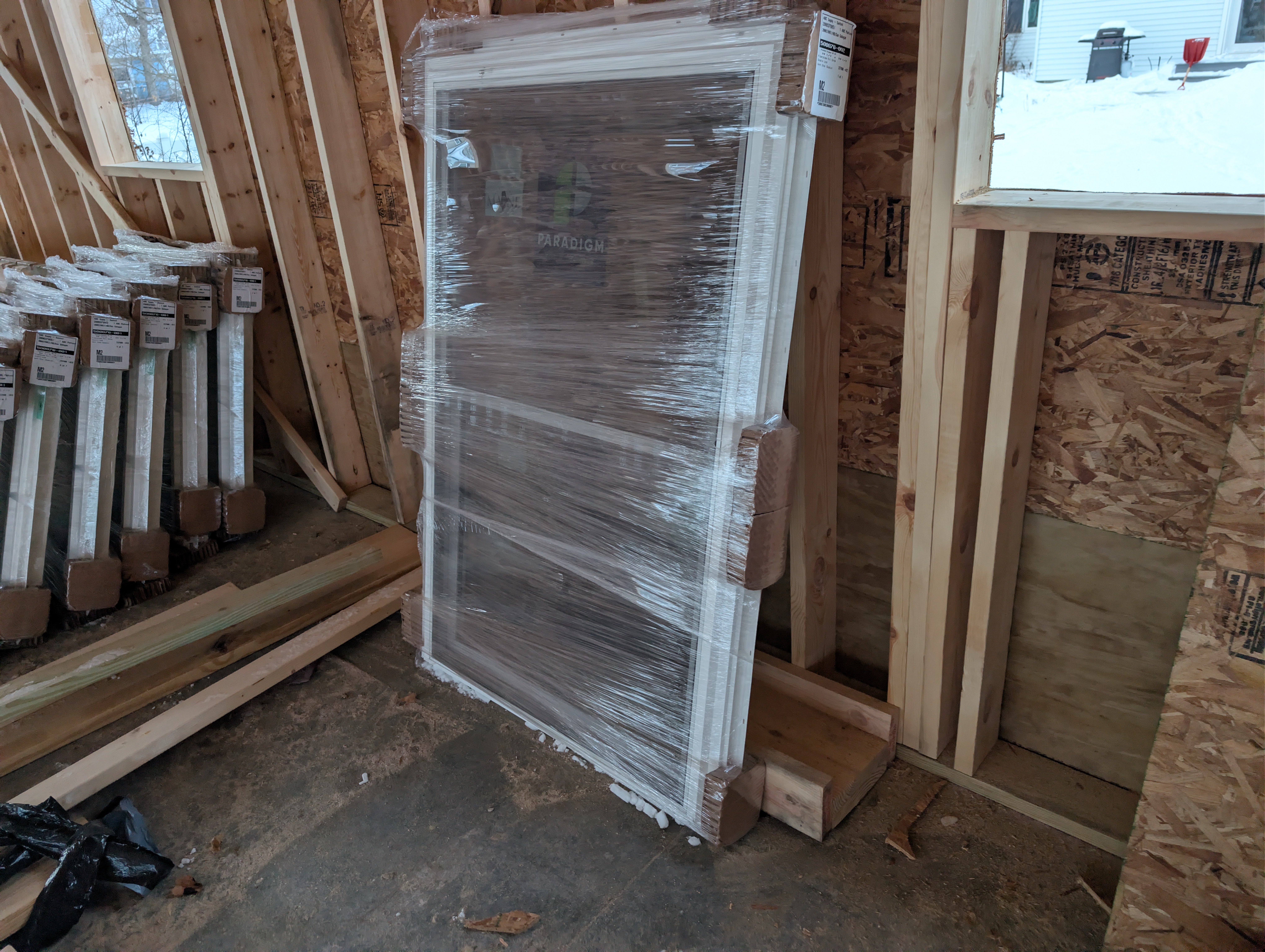 Large window unit leaning against wall