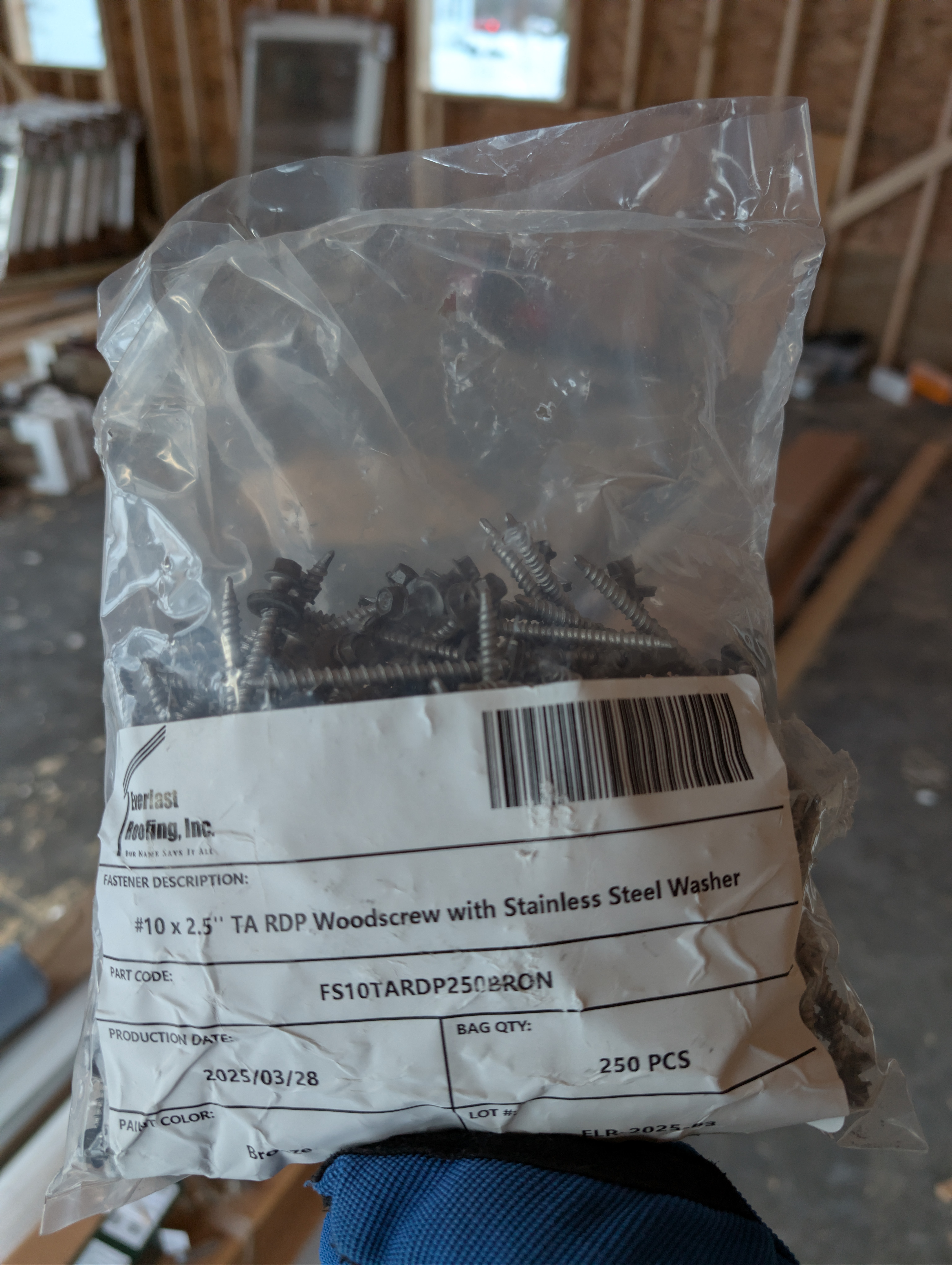 Bag of #10 x 2.5" woodscrews with stainless steel washers