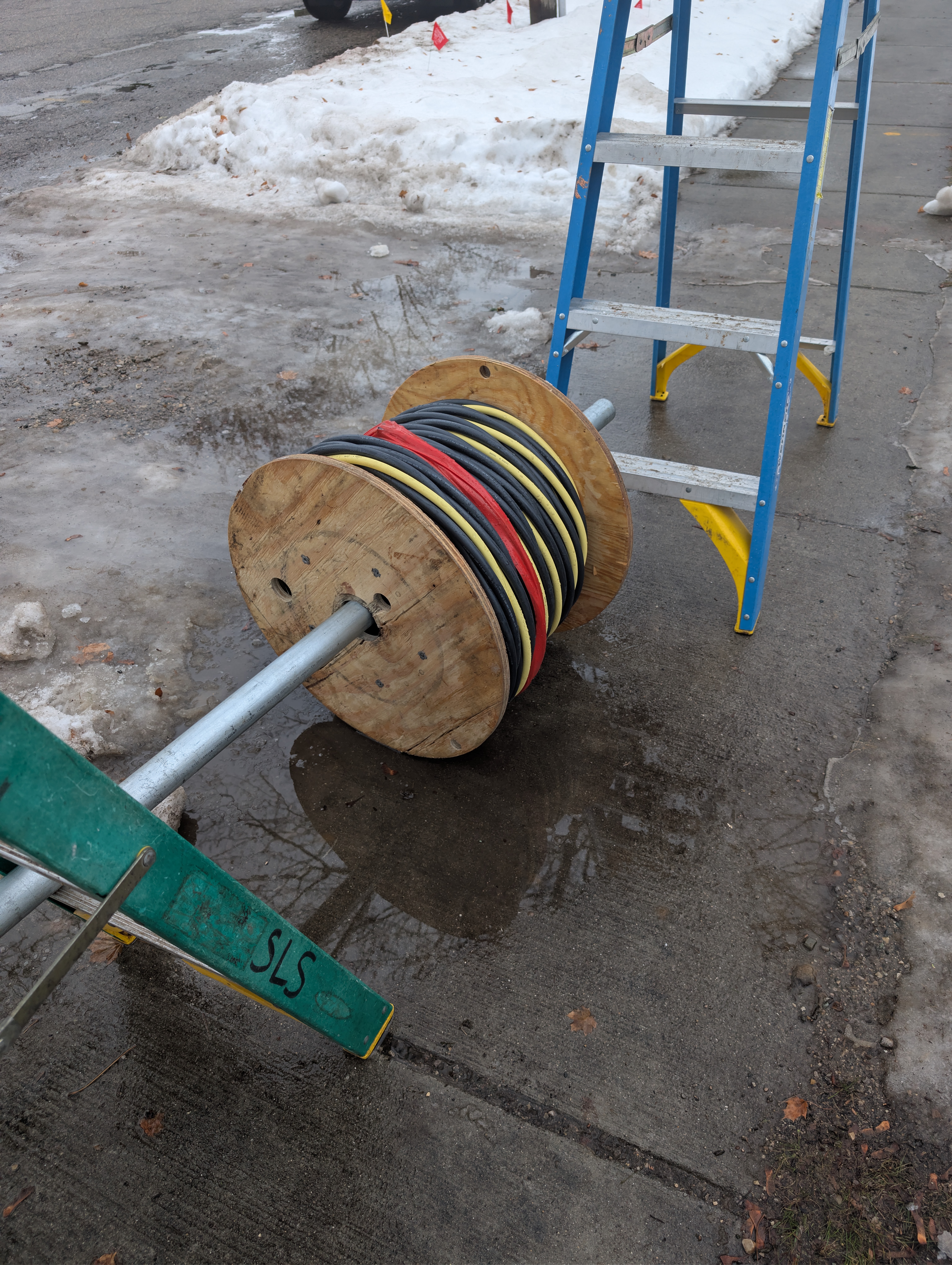 200A electrical wire spool on wooden reel marked SLS